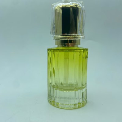 Flacone di lozione in vetro giallo Premium da 40 ml con pompetta dorata, flacone cosmetico OEM