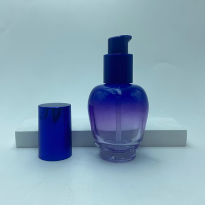 Bottiglia di lozione di vetro 30ml Bottolina di siero a gradiente blu con pompa di olio Bottiglia di pompa Bottiglia cosmetica OEM