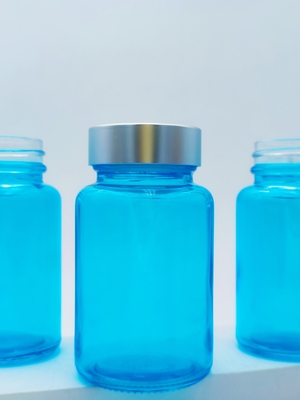 Flacone capsula in vetro da 100 ml per capelli, flacone rotondo in vetro a capsula per siero occhi e siero viso OEM