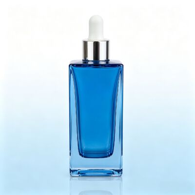 Flacone contagocce in vetro trasparente blu, flacone per imballaggio di siero cosmetico con base spessa e quadrata con contagocce in gomma bianca