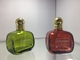 Colore rosso verde trasparente di lusso delle bottiglie di profumo dello spruzzatore dell'atomizzatore